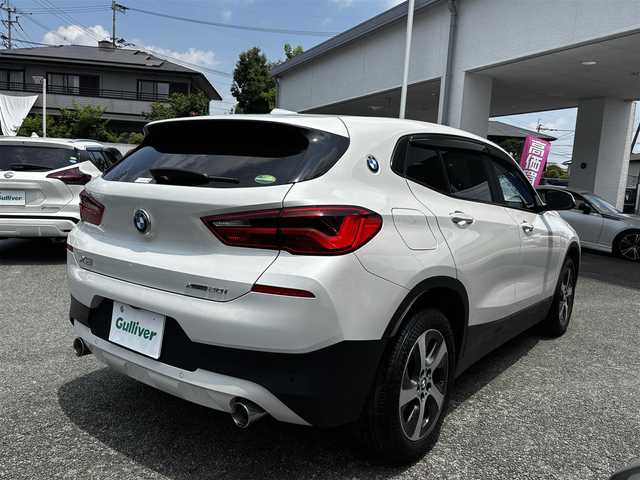 ＢＭＷ Ｘ２ xDrive20i 熊本県 2018(平30)年 4.1万km ミネラルホワイト 純正ナビ/【CD/DVD/USB/BT】/バックカメラ/アダプティブクルーズコントロール/衝突軽減ブレーキ/車線逸脱警報/コーナーセンサー/前後ドライブレコーダー/ステアリングリモコン/パワーバックドア/前席シートヒーター/アイドリングストップ/電動パーキング/オートライト/LEDヘッドライト/フォグランプ/純正17インチAW/プッシュスタート/スマートキー/スペアキー/純正フロアマット/取扱説明書