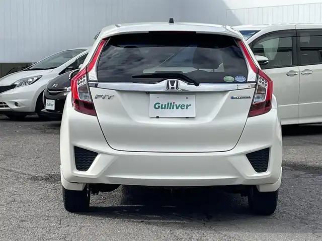 ホンダ フィット ハイブリット Lパッケージ 福島県 2015(平27)年 15.6万km プレミアムホワイトパール 純正ナビ/バックカメラ/フルセグテレビ/Bluetooth接続/クルーズコントロール/オートライト/キセノンライト/フォグランプ/保証書/ワンオーナー