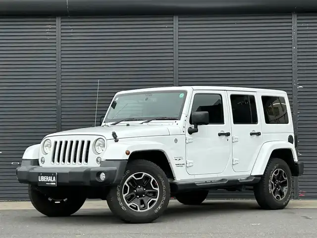 クライスラー・ジープ ジープ ラングラー アンリミテッド サハラ 茨城県 2016(平28)年 5.8万km ブライトホワイト 社外９インチ型ナビ/フルセグTV/バック＆左サイドカメラ/ETC/自動防眩機能ミラー/ヒルディセントコントロール/クルーズコントロール/トランスファー/オートライト/ヘッドライトレベライザー/ヒーテッドドアミラー/ALPINEスピーカー/純正フロアマット/純正アルミホイール/リモコンキー