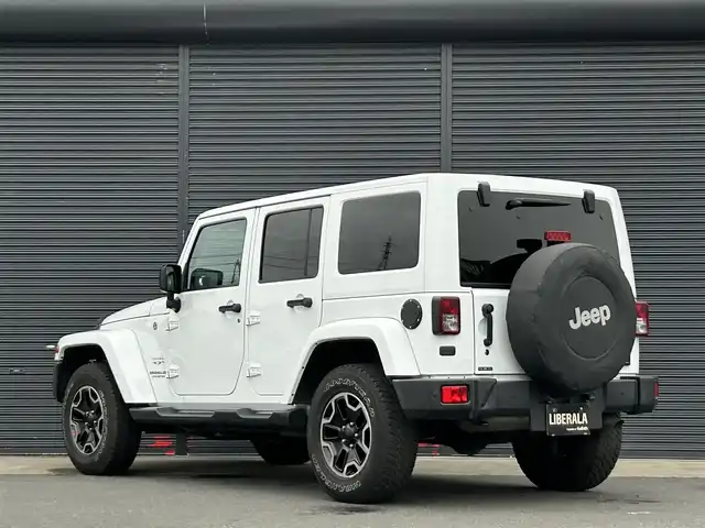 クライスラー・ジープ ジープ ラングラー アンリミテッド サハラ 茨城県 2016(平28)年 5.8万km ブライトホワイト 社外９インチ型ナビ/フルセグTV/バック＆左サイドカメラ/ETC/自動防眩機能ミラー/ヒルディセントコントロール/クルーズコントロール/トランスファー/オートライト/ヘッドライトレベライザー/ヒーテッドドアミラー/ALPINEスピーカー/純正フロアマット/純正アルミホイール/リモコンキー