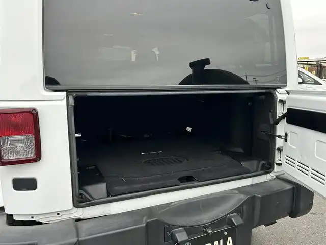 クライスラー・ジープ ジープ ラングラー アンリミテッド サハラ 茨城県 2016(平28)年 5.8万km ブライトホワイト 社外９インチ型ナビ/フルセグTV/バック＆左サイドカメラ/ETC/自動防眩機能ミラー/ヒルディセントコントロール/クルーズコントロール/トランスファー/オートライト/ヘッドライトレベライザー/ヒーテッドドアミラー/ALPINEスピーカー/純正フロアマット/純正アルミホイール/リモコンキー