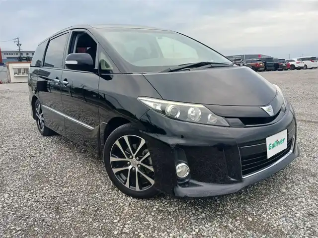 トヨタ エスティマ アエラス プレミアムエディション 福岡県 2014(平26)年 7.4万km ブラック カロッツェリアナビ/フルセグTV/両側パワースライドドア/バックモニター/ビルトインETC/ドライブレコーダー/パイオニア10型フリップダウンモニター/クルーズコントロール/HIDヘッドランプ/オートライト/オートエアコン/リアクーラー/革巻きステアリング/ステアリングスイッチ/ハーフレザーシート/運転席パワーシート/純正18インチアルミホイール/スマートキー/プッシュエンジンスタート/禁煙車