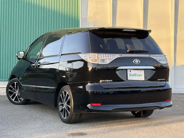 トヨタ エスティマ アエラス プレミアムエディション 福岡県 2014(平26)年 7.5万km ブラック カロッツェリアナビ/フルセグTV/両側パワースライドドア/バックモニター/ビルトインETC/ドライブレコーダー/パイオニア10型フリップダウンモニター/クルーズコントロール/HIDヘッドランプ/オートライト/オートエアコン/リアクーラー/革巻きステアリング/ステアリングスイッチ/ハーフレザーシート/運転席パワーシート/純正18インチアルミホイール/スマートキー/プッシュエンジンスタート/禁煙車