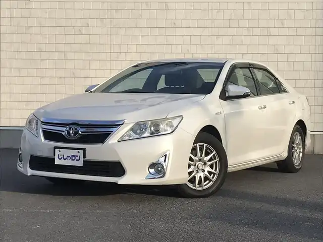 トヨタ カムリ ハイブリット 栃木県 2012(平24)年 7.8万km ホワイトパールクリスタルシャイン (株)IDOMが運営する【じしゃロン小山店】の自社ローン対象車両になります。こちらは現金ご利用時の価格です。/自社ローンご希望の方は別途その旨お申付け下さい。//純正ワンセグナビ/（CD/DVD/AM/FMラジオ）/スマートキー/プッシュスタート/ＥＴＣ/ステアリングリモコン/電動格納ドアミラー/パワーウインドウ/オートライト/防眩ミラー/シートカバー