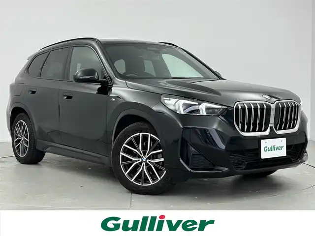 ＢＭＷ ＢＭＷ Ｘ１ xDrive 20i Mスポーツ 愛知県 2023(令5)年 1.9万km 黒 純正ナビ/Bluetooth/USB/衝突軽減ブレーキ/全方位カメラ/コーナーセンサー/ドライブレコーダー/ETC/ハーフレザーシート/前席パワーシート/前席シートヒーター/電動リアゲート/スマートキー/プッシュスタート/LEDヘッドライト/オートライト/オートマチックハイビーム/MTモード付/横滑り防止装置