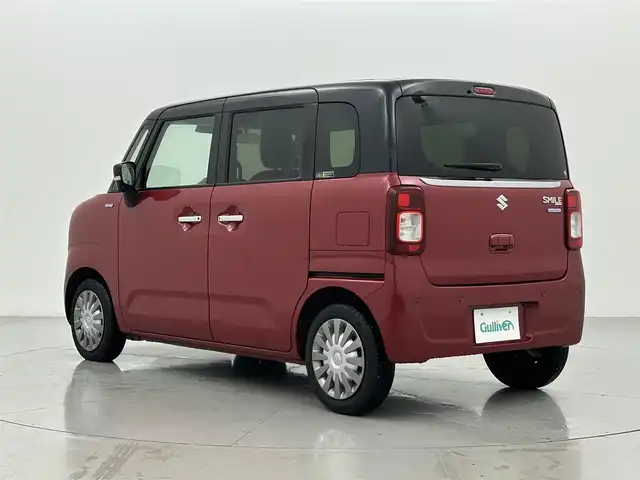 スズキ ワゴンＲ スマイル HYBRID X 熊本県 2021(令3)年 2万km フェニックスレッドパール/ブルーイッシュブラックパール 純正９インチナビ（CD・DVD・フルセグ・BT・ApplCarPlay・AndroidAuto・USB）/全周囲カメラ/ビルトインETC/両側パワースライドドア/スズキセーフティサポート/・デュアルセンサーブレーキサポート/・発進お知らせ機能/・標識認識機能/・車線維持機能/・車線逸脱抑制機能/・ふらつき警報機能/・前後誤発進抑制機能/・ハイビームアシスト/・低速時ブレーキサポート/横滑り防止/アイドリングストップ/運転席シートヒーター/純正フロアマット/オートライト/LEDヘッドライト/電動格納ミラー/スマートキー/プッシュスタート/スペアキー1本/保証書/取扱説明書