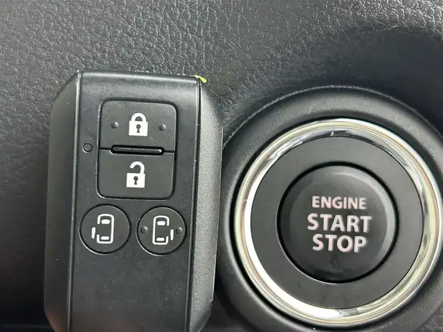 スズキ ワゴンＲ スマイル HYBRID X 熊本県 2021(令3)年 2万km フェニックスレッドパール/ブルーイッシュブラックパール 純正９インチナビ（CD・DVD・フルセグ・BT・ApplCarPlay・AndroidAuto・USB）/全周囲カメラ/ビルトインETC/両側パワースライドドア/スズキセーフティサポート/・デュアルセンサーブレーキサポート/・発進お知らせ機能/・標識認識機能/・車線維持機能/・車線逸脱抑制機能/・ふらつき警報機能/・前後誤発進抑制機能/・ハイビームアシスト/・低速時ブレーキサポート/横滑り防止/アイドリングストップ/運転席シートヒーター/純正フロアマット/オートライト/LEDヘッドライト/電動格納ミラー/スマートキー/プッシュスタート/スペアキー1本/保証書/取扱説明書