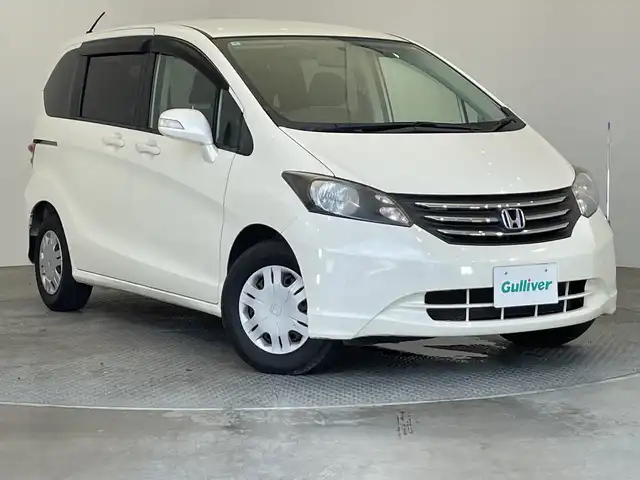 ホンダ フリード G ジャストセレクション 栃木県 2010(平22)年 7.6万km プレミアムホワイトパール 純正ナビ/(CD/DVD/ワンセグTV)/バックカメラ/コーナーポール/片側パワースライドドア/ウォークスルー/純正フロアマット/電動格納ミラー/ウィンカーミラー/スペアキー1本/取扱説明書