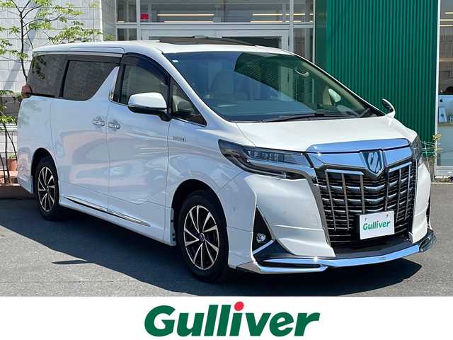 トヨタ アルファードハイブリット X 青森県 2019(平31)年 4.2万km ホワイトパールクリスタルシャイン 4WD/TコネクトSDナビ・フルセグTV/JBLプレミアムサウンド/CD・DVD・Bluetooth・SD/ツインムーンルーフ/OPインテリジェントパーキングアシスト2/OPデジタルインナーミラー/両側パワースライドドア/セーフティセンス/プリクラッシュセーフティ/レーダークルーズコントロール/レーントレーシングアシスト/オートマチックハイビーム/ロードサインアシスト/OPブラインドスポットモニター/前後ドライブレコーダー/AC100V100W/ビルトインETC2.0/LEDヘッドライト/LEDフォグライト/社外17インチアルミ/モデリスタエアロ