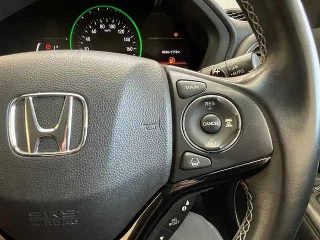 ホンダ ヴェゼル ハイブリッド Z ホンダセンシング 岩手県 2016(平28)年 10万km ホワイトオーキッドパール ４WD/ホンダセンシング/衝突軽減ブレーキ/アダプティブクルーズコントロール/車線維持支援システム/路外逸脱抑制機能/誤発進抑制機能/標識認識機能/横滑り防止装置/オートブレーキホールド/パドルシフト/チップアップリヤシート/前席シートヒーター/純正ナビ/（CD/DVD/フルセグ/SD/USB/HDMI/Bluetooth）/ステアリングスイッチ/バックカメラ/ETC/LEDヘッドライト/LEDフォグランプ/純正17インチアルミホイール