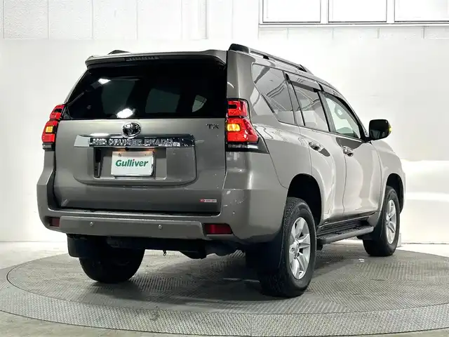 トヨタ ランドクルーザー プラド TX Lパッケージ 大阪府 2023(令5)年 1.5万km アバンギャルドブロンズメタリック サンルーフ 本革シート 純正ナビ(フルセグ/DVD再生/Bluetooth) バックカメラ ETC パワーシート/ヒーター/エアコン 衝突軽減 レーダークルコン クリアランスソナー ルーフレール