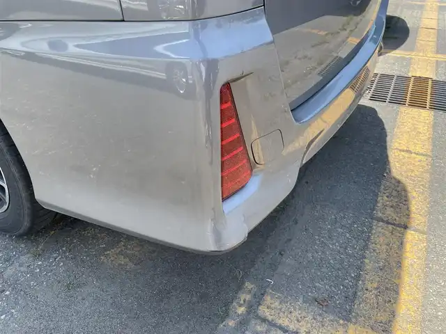 トヨタ ヴォクシー ZS 煌 新潟県 2015(平27)年 6.5万km アイスチタニウムマイカメタリック 禁煙車/4WD/社外メモリナビ/フルセグ/　CD/DVD/Bluetooth/社外フリップダウンモニター/バックカメラ/両側パワースライドドア/スマートキー/純正エンジンスターター/LEDヘッドライト/オートライト/フォグランプ/革巻きステアリング/ワイパーデアイサー/プッシュスタート/ETC/社外アルミ付きスタッドレス/　（積み込み６mm）