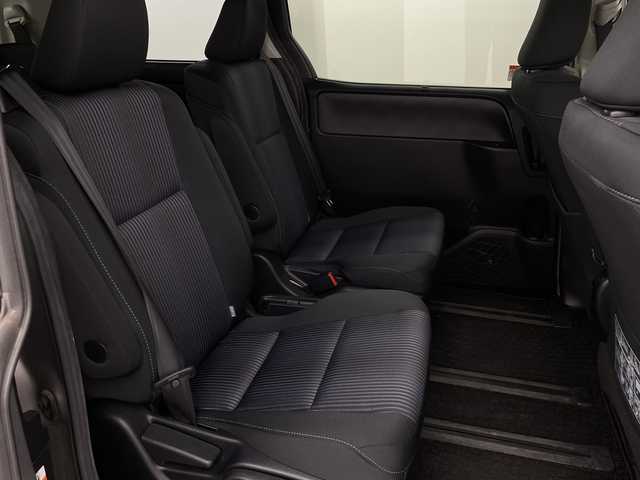 トヨタ ヴォクシー ZS 煌 新潟県 2015(平27)年 6.5万km アイスチタニウムマイカメタリック 禁煙車/4WD/社外メモリナビ/フルセグ/　CD/DVD/Bluetooth/社外フリップダウンモニター/バックカメラ/両側パワースライドドア/スマートキー/純正エンジンスターター/LEDヘッドライト/オートライト/フォグランプ/革巻きステアリング/ワイパーデアイサー/プッシュスタート/ETC/社外アルミ付きスタッドレス/　（積み込み６mm）