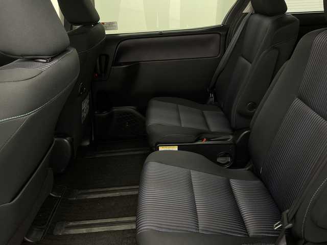 トヨタ ヴォクシー ZS 煌 新潟県 2015(平27)年 6.5万km アイスチタニウムマイカメタリック 禁煙車/4WD/社外メモリナビ/フルセグ/　CD/DVD/Bluetooth/社外フリップダウンモニター/バックカメラ/両側パワースライドドア/スマートキー/純正エンジンスターター/LEDヘッドライト/オートライト/フォグランプ/革巻きステアリング/ワイパーデアイサー/プッシュスタート/ETC/社外アルミ付きスタッドレス/　（積み込み６mm）