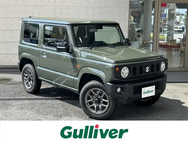 スズキ ジムニー XC 兵庫県 2023(令5)年 0.6万km ジャングルグリーン 4WD/社外ナビ（CN-E330D）/　　（AM/FM/CD//BT)/ワンセグTV/バックカメラ/プッシュスタート/スズキセーフティーサポート/レーンアシスト/衝突被害軽減ブレーキ/横滑り防止装置/ダウンヒルアシストコントロール/アイドリングストップ/ステアリングリモコン/クルーズコントロール/ビルドインETC/シートヒーター/純正フロアマット/LEDヘットライト/純正16インチアルミホイール/スマートキー/取扱説明書/保証書