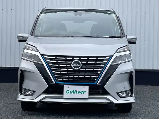 日産 セレナ e－パワー ハイウェイスター V 千葉県 2021(令3)年 1.1万km ブリリアントシルバー 純正10インチナビ/(TV/CD/DVD/Bluetooth)/フリップダウンモニター/プロパイロット/ブラインドスポットモニター/デジタルインナーミラー/360°カメラ/衝突被害軽減システム/車線逸脱警報/クルーズコントロール/両側パワースライドドア/横滑り防止装置/ETC/ドライブレコーダー/アイドリングストップ/LEDヘッドライト/フォグランプ/オートライト/ウィンカーミラー/電動格納ミラー/純正15インチAW/プッシュスタート/スマートキー/フロアマット/ドアバイザー