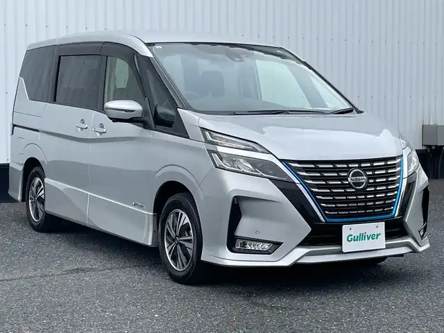 日産 セレナ e－パワー ハイウェイスター V 千葉県 2021(令3)年 1.1万km ブリリアントシルバー 純正10インチナビ/(TV/CD/DVD/Bluetooth)/フリップダウンモニター/プロパイロット/ブラインドスポットモニター/デジタルインナーミラー/360°カメラ/衝突被害軽減システム/車線逸脱警報/クルーズコントロール/両側パワースライドドア/横滑り防止装置/ETC/ドライブレコーダー/アイドリングストップ/LEDヘッドライト/フォグランプ/オートライト/ウィンカーミラー/電動格納ミラー/純正15インチAW/プッシュスタート/スマートキー/フロアマット/ドアバイザー