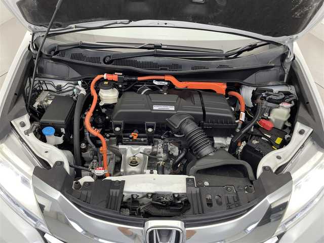 ホンダ オデッセイ ハイブリッド EX　パッケージ 滋賀県 2016(平28)年 7.1万km ホワイトオーキッドパール 社外7インチナビ/【Bluetooth/DVD/CD/フルセグTV】/両側パワースライドドア/ホンダセンシング/・衝突軽減ブレーキ 〈CMBS〉/・歩行者事故低減ステアリング/・アダプティブクルーズコントロール/・LKAS 〈車線維持支援システム〉/・路外逸脱抑制機能/・誤発進抑制機能/・先行車発進お知らせ機能/・標識認識機能/バックカメラ/純正フリップダウンモニター/AC100V電源/ビルトイン純正ETC/LEDヘッドライト/エンジンスターター/純正フロアマット/D席パワーシート/コンフォートビューパッケージ/二列目オットマン/ステアリングリモコン/スマートキー/プッシュスタート