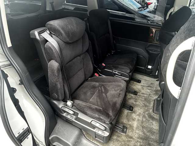 ホンダ オデッセイ ハイブリッド EX　パッケージ 滋賀県 2016(平28)年 7.1万km ホワイトオーキッドパール 社外7インチナビ/【Bluetooth/DVD/CD/フルセグTV】/両側パワースライドドア/ホンダセンシング/・衝突軽減ブレーキ 〈CMBS〉/・歩行者事故低減ステアリング/・アダプティブクルーズコントロール/・LKAS 〈車線維持支援システム〉/・路外逸脱抑制機能/・誤発進抑制機能/・先行車発進お知らせ機能/・標識認識機能/バックカメラ/純正フリップダウンモニター/AC100V電源/ビルトイン純正ETC/LEDヘッドライト/エンジンスターター/純正フロアマット/D席パワーシート/コンフォートビューパッケージ/二列目オットマン/ステアリングリモコン/スマートキー/プッシュスタート