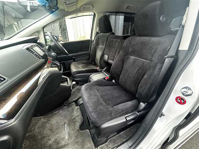 ホンダ オデッセイ ハイブリッド EX　パッケージ 滋賀県 2016(平28)年 7.1万km ホワイトオーキッドパール 社外7インチナビ/【Bluetooth/DVD/CD/フルセグTV】/両側パワースライドドア/ホンダセンシング/・衝突軽減ブレーキ 〈CMBS〉/・歩行者事故低減ステアリング/・アダプティブクルーズコントロール/・LKAS 〈車線維持支援システム〉/・路外逸脱抑制機能/・誤発進抑制機能/・先行車発進お知らせ機能/・標識認識機能/バックカメラ/純正フリップダウンモニター/AC100V電源/ビルトイン純正ETC/LEDヘッドライト/エンジンスターター/純正フロアマット/D席パワーシート/コンフォートビューパッケージ/二列目オットマン/ステアリングリモコン/スマートキー/プッシュスタート