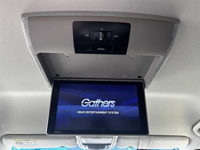 ホンダ オデッセイ ハイブリッド EX　パッケージ 滋賀県 2016(平28)年 7.1万km ホワイトオーキッドパール 社外7インチナビ/【Bluetooth/DVD/CD/フルセグTV】/両側パワースライドドア/ホンダセンシング/・衝突軽減ブレーキ 〈CMBS〉/・歩行者事故低減ステアリング/・アダプティブクルーズコントロール/・LKAS 〈車線維持支援システム〉/・路外逸脱抑制機能/・誤発進抑制機能/・先行車発進お知らせ機能/・標識認識機能/バックカメラ/純正フリップダウンモニター/AC100V電源/ビルトイン純正ETC/LEDヘッドライト/エンジンスターター/純正フロアマット/D席パワーシート/コンフォートビューパッケージ/二列目オットマン/ステアリングリモコン/スマートキー/プッシュスタート