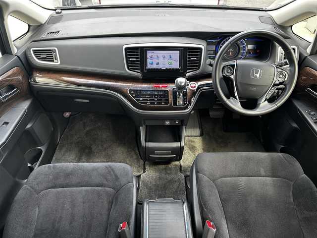 ホンダ オデッセイ ハイブリッド EX　パッケージ 滋賀県 2016(平28)年 7.1万km ホワイトオーキッドパール 社外7インチナビ/【Bluetooth/DVD/CD/フルセグTV】/両側パワースライドドア/ホンダセンシング/・衝突軽減ブレーキ 〈CMBS〉/・歩行者事故低減ステアリング/・アダプティブクルーズコントロール/・LKAS 〈車線維持支援システム〉/・路外逸脱抑制機能/・誤発進抑制機能/・先行車発進お知らせ機能/・標識認識機能/バックカメラ/純正フリップダウンモニター/AC100V電源/ビルトイン純正ETC/LEDヘッドライト/エンジンスターター/純正フロアマット/D席パワーシート/コンフォートビューパッケージ/二列目オットマン/ステアリングリモコン/スマートキー/プッシュスタート