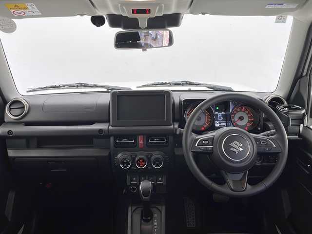 スズキ ジムニー ノマド FC 長野県 2025(令7)年 0.4万km アークティックホワイトパール 4WD/衝突軽減ブレーキ/車線逸脱防止/レーダークルーズコントロール/コーナーセンサー/前席シートヒーター/LEDヘッドライト/ダウンヒルアシストコントロール/ヒーテッドドアミラー/ヘッドライトレベライザー/ヘッドライトウォッシャー/オートライト/アイドリングストップ/プッシュスタート/スマートキー/スペアキー