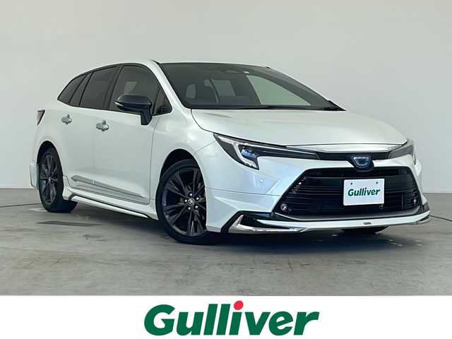 トヨタ カローラツーリング ハイブリッド ダブルバイビー 愛知県 2023(令5)年 3.4万km プラチナホワイトパールマイカ /禁煙車//モデリスタエアロ//純正10.25インチナビ//フルセグTV・AMFM・Bluetooth・USB//バックカメラ//ビルトインETC2.0//前後ドライブレコーダー(バックカメラ併用)//トヨタセーフティセンス//レーダークルーズコントロール//プロアクティブドライビングアシスト//前後クリアランスソナー//LEDヘッドライト//オートライト//フロントフォグランプ//合皮&レザテックシート//純正17インチアルミホイール//革巻きステアリング//ステアリングスイッチ//プッシュスタート//電動格納ミラー//イモビライザー