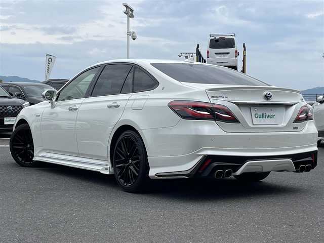 トヨタ クラウン ハイブリッド RS アドバンス 島根県 2018(平30)年 8.4万km ホワイトパールクリスタルシャイン ワンオーナー/TOMSエアロ/純正8インチナビ/CD/DVD/DTV/Bluetooth/USB/バックカメラ/・トヨタセーフティセンス/・衝突軽減システム/・衝突軽減ブレーキ/・車線逸脱抑制機能/・車線逸脱警報/・コーナーセンサー/・ロードサインアシスト/・発進お知らせ機能/・ふらつき警報/・パーキングサポートブレーキ/・標識認識機能/・緊急時蛇行支援/・後方車両接近告知/ブラインドスポットモニター/ハーフレザー調シート/パワーシート/シートヒーター /メモリーシート /ステアリングスイッチ/レーダークルーズコントロール/電子パーキングブレーキ/ブレーキホールド/LEDオートライト/ヘッドアップディスプレイ/パドルシフト