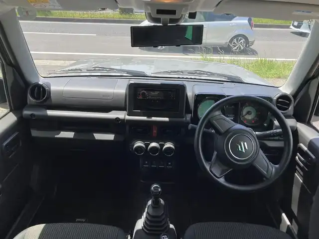 スズキ ジムニー XL 佐賀県 2021(令3)年 2.3万km ミディアムグレー 禁煙車/ワンオーナー車/スズキセーフティサポート/社外CDオーディオ/ Bluetooth/USB/AUX/CD/FM/AM/シートヒーター/横滑り防止装置/ヒーテッドドアミラー/電動格納ミラー/ヘッドライトレベライザー/スマートキー2個/AUTOライト/フォグランプ/車両取扱説明書/新車時保証書