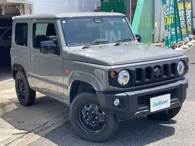 スズキ ジムニー XL 佐賀県 2021(令3)年 2.3万km ミディアムグレー 禁煙車/ワンオーナー車/スズキセーフティサポート/社外CDオーディオ/ Bluetooth/USB/AUX/CD/FM/AM/シートヒーター/横滑り防止装置/ヒーテッドドアミラー/電動格納ミラー/ヘッドライトレベライザー/スマートキー2個/AUTOライト/フォグランプ/車両取扱説明書/新車時保証書