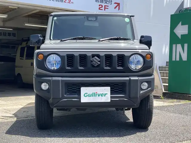 スズキ ジムニー XL 佐賀県 2021(令3)年 2.3万km ミディアムグレー 禁煙車/ワンオーナー車/スズキセーフティサポート/社外CDオーディオ/ Bluetooth/USB/AUX/CD/FM/AM/シートヒーター/横滑り防止装置/ヒーテッドドアミラー/電動格納ミラー/ヘッドライトレベライザー/スマートキー2個/AUTOライト/フォグランプ/車両取扱説明書/新車時保証書