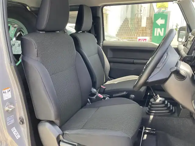 スズキ ジムニー XL 佐賀県 2021(令3)年 2.3万km ミディアムグレー 禁煙車/ワンオーナー車/スズキセーフティサポート/社外CDオーディオ/ Bluetooth/USB/AUX/CD/FM/AM/シートヒーター/横滑り防止装置/ヒーテッドドアミラー/電動格納ミラー/ヘッドライトレベライザー/スマートキー2個/AUTOライト/フォグランプ/車両取扱説明書/新車時保証書
