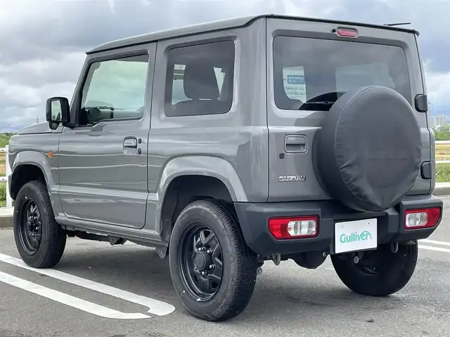 スズキ ジムニー XL 佐賀県 2021(令3)年 2.3万km ミディアムグレー ワンオーナー/パートタイム４WD/５速MTミッション/衝突被害軽減ブレーキ/車線逸脱警報/横滑り防止装置/社外オーディオ/・AM/FM/CD/USB/Bluetooth/ビルトインETC/D+N席シートヒーター/ミラーヒーター/プッシュスタート/スマートキー/純正フォグライト/純正フロアマット/新車保証書/取扱説明書/スペアキー１本