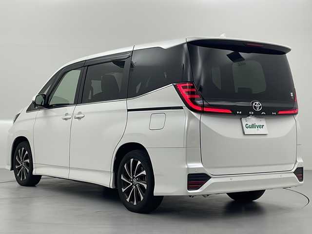 トヨタ ノア S－Z 岐阜県 2022(令4)年 1.9万km ホワイトパールクリスタルシャイン トヨタセーフティセンス/・プリクラッシュセーフティ/・レーンディパーチャーアラート/・オートハイビーム/・レーダークルーズコントロール/クリアランスソナー/パーキングアシストブレーキ/10.5インチ純正ディスプレイオーディオ/・ナビキット/フルセグTV/Bluetooth/CD/DVD/HDMI/純正フリップダウンモニター/快適利便パッケージ/・パワーバックドア/・後席オットマン/・後席シートヒーター/プロジェクターLED/両側パワースライドドア/純正ドライブレコーダー/ビルトインETC2.0/ハーフレザーシート/・シートヒーター/革巻きステアリング/・ステアリングスイッチ/・ステアリングヒーター/プッシュスタート/スマートキー/LEDヘッドライト/・フォグランプ/純正フロアマット/純正ドアバイザー