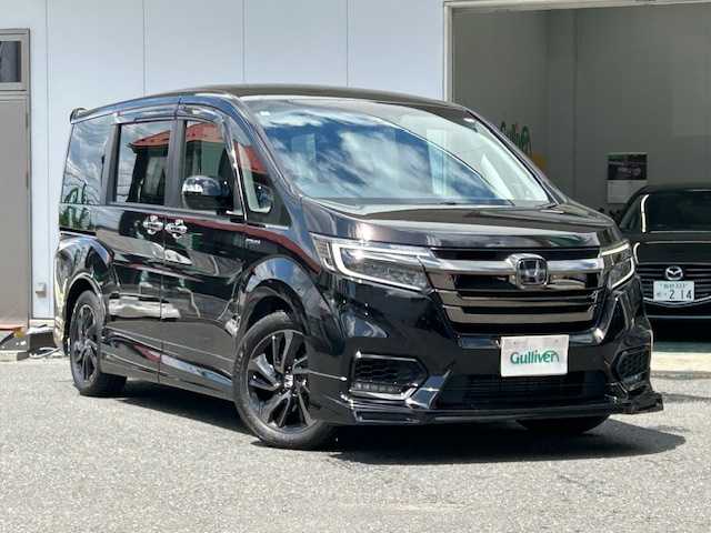 ホンダ ステップワゴン スパーダ クルスピセンシング 宮城県 2021(令3)年 4.1万km プレミアムスパークルブラックパール 純正メモリナビ/純正フリップダウンモニター/DVD/BT/FM/AM/フルセグテレビ/前後ドライブレコーダー/純正エンジンスターター/両側パワースライドドア/純正夏タイヤ17インチ/パドルシフト/ETC2.0/前席シートヒーター/ハーフレザー/純正フロアマット/バックカメラ/わくわくゲート/ウォークスルー/追従クルーズコントロール/レーンアシスト/衝突被害軽減システム/横滑り防止装置/LEDライト/アイドリングストップ/プッシュスタート/ウィンカーミラー/保証書・記録簿・取扱説明書