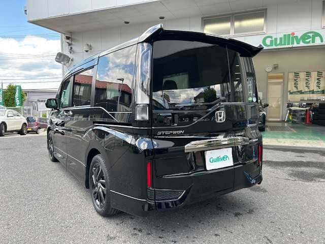 ホンダ ステップワゴン スパーダ クルスピセンシング 宮城県 2021(令3)年 4.1万km プレミアムスパークルブラックパール 純正メモリナビ/純正フリップダウンモニター/DVD/BT/FM/AM/フルセグテレビ/前後ドライブレコーダー/純正エンジンスターター/両側パワースライドドア/純正夏タイヤ17インチ/パドルシフト/ETC2.0/前席シートヒーター/ハーフレザー/純正フロアマット/バックカメラ/わくわくゲート/ウォークスルー/追従クルーズコントロール/レーンアシスト/衝突被害軽減システム/横滑り防止装置/LEDライト/アイドリングストップ/プッシュスタート/ウィンカーミラー/保証書・記録簿・取扱説明書