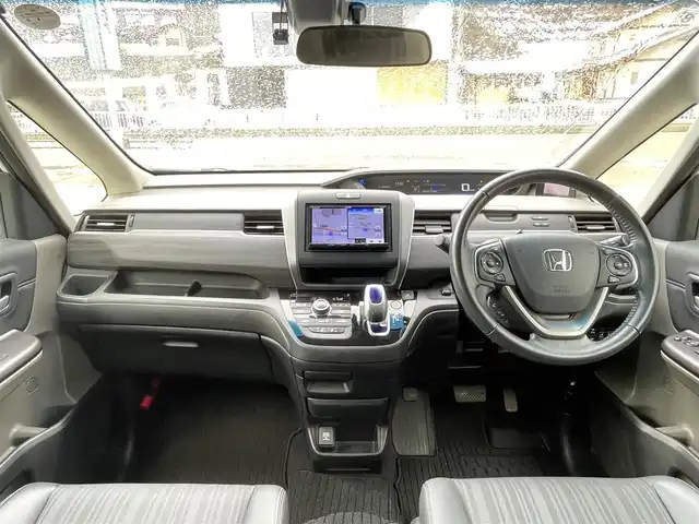 ホンダ フリード ハイブリット G ホンダセンシング 岐阜県 2017(平29)年 9.8万km ホワイトオーキッドパール ワンオーナー/4WD/両側パワースライドドア/後席モニター/ナビ/【Bluetooth．CD.TV.AM/FM】/バックカメラ/レザーシート/シートヒーター/コーナーセンサー/衝突被害軽減システム/レーンキープアシスト/クルーズコントロール/ETC/ドライブレコーダー/純正フロアマット/電動格納ドアミラー/ウィンカーミラー/ドアバイザー/サンシェード/横滑り防止装置/保証書/取扱説明書/スペアキー