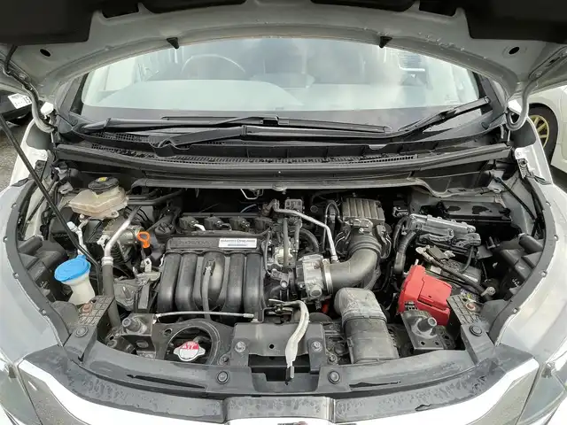 ホンダ フリード ハイブリット G ホンダセンシング 岐阜県 2017(平29)年 9.8万km ホワイトオーキッドパール ワンオーナー/4WD/両側パワースライドドア/後席モニター/ナビ/【Bluetooth．CD.TV.AM/FM】/バックカメラ/レザーシート/シートヒーター/コーナーセンサー/衝突被害軽減システム/レーンキープアシスト/クルーズコントロール/ETC/ドライブレコーダー/純正フロアマット/電動格納ドアミラー/ウィンカーミラー/ドアバイザー/サンシェード/横滑り防止装置/保証書/取扱説明書/スペアキー