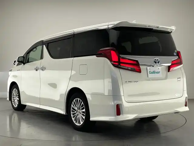 トヨタ アルファードハイブリット SR Cパッケージ 愛知県 2021(令3)年 2.1万km ラグジュアリーホワイトパールクリスタルシャインガラスフレーク 純９型ナビ　サンルーフ　デジイン　３眼ＬＥＤ　純１２型後席モニター　黒革　ＢＳＭ　バックカメラ　ＤＶＤ　エアシート　セーフティセンス　衝突軽減　追従クルコン　ＥＴＣ２．０　両側パワスラ　電動リヤゲート　デジタルインナーミラー　ツインムーンルーフ　後席エアコン　フリップダウンモニター　オートハイビーム　nanoe ステアリングヒーター　シートヒーター　カーテンエアバッグ　純正フロアマット　Bluetooth
