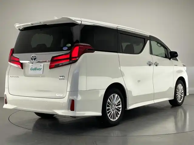 トヨタ アルファードハイブリット SR Cパッケージ 愛知県 2021(令3)年 2.1万km ラグジュアリーホワイトパールクリスタルシャインガラスフレーク 純９型ナビ　サンルーフ　デジイン　３眼ＬＥＤ　純１２型後席モニター　黒革　ＢＳＭ　バックカメラ　ＤＶＤ　エアシート　セーフティセンス　衝突軽減　追従クルコン　ＥＴＣ２．０　両側パワスラ　電動リヤゲート　デジタルインナーミラー　ツインムーンルーフ　後席エアコン　フリップダウンモニター　オートハイビーム　nanoe ステアリングヒーター　シートヒーター　カーテンエアバッグ　純正フロアマット　Bluetooth