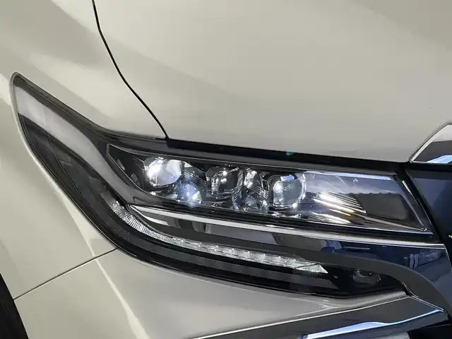 トヨタ アルファードハイブリット SR Cパッケージ 愛知県 2021(令3)年 2.1万km ラグジュアリーホワイトパールクリスタルシャインガラスフレーク 純９型ナビ　サンルーフ　デジイン　３眼ＬＥＤ　純１２型後席モニター　黒革　ＢＳＭ　バックカメラ　ＤＶＤ　エアシート　セーフティセンス　衝突軽減　追従クルコン　ＥＴＣ２．０　両側パワスラ　電動リヤゲート　デジタルインナーミラー　ツインムーンルーフ　後席エアコン　フリップダウンモニター　オートハイビーム　nanoe ステアリングヒーター　シートヒーター　カーテンエアバッグ　純正フロアマット　Bluetooth