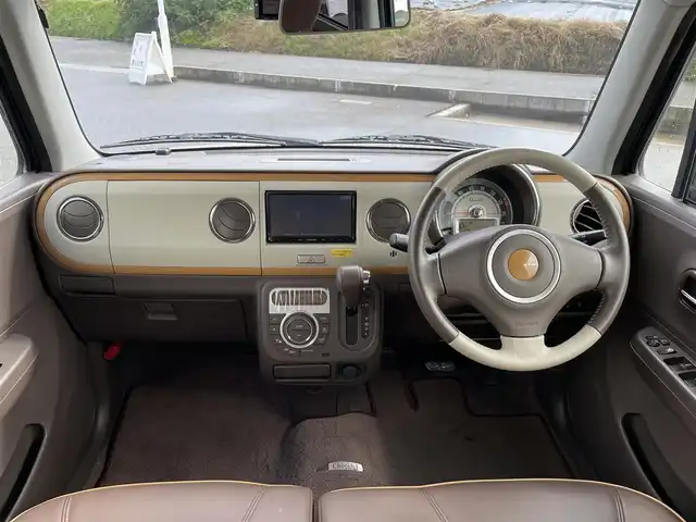 スズキ ラパン ショコラ X 富山県 2015(平27)年 2.5万km シャンパンピンクパール/メタリックホワイト ワンオーナー／/４ＷＤ／/社外７インチナビ／/ワンセグＴＶ／/ＤＶＤ再生／/Ｂｌｕｅｔｏｏｔｈ／/バックカメラ／/前後ドライブレコーダー／/ビルトインＥＴＣ／/スマートキー／/ＨＩＤオートライト