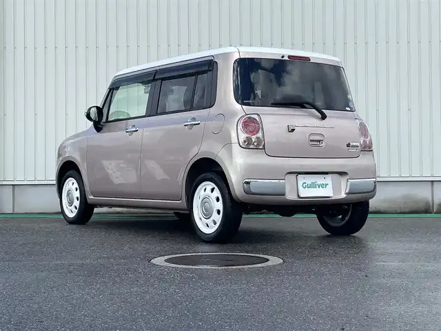 スズキ ラパン ショコラ X 富山県 2015(平27)年 2.5万km シャンパンピンクパール/メタリックホワイト ワンオーナー／/４ＷＤ／/社外７インチナビ／/ワンセグＴＶ／/ＤＶＤ再生／/Ｂｌｕｅｔｏｏｔｈ／/バックカメラ／/前後ドライブレコーダー／/ビルトインＥＴＣ／/スマートキー／/ＨＩＤオートライト