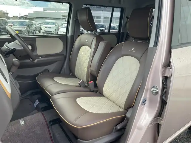 スズキ ラパン ショコラ X 富山県 2015(平27)年 2.5万km シャンパンピンクパール/メタリックホワイト ワンオーナー／/４ＷＤ／/社外７インチナビ／/ワンセグＴＶ／/ＤＶＤ再生／/Ｂｌｕｅｔｏｏｔｈ／/バックカメラ／/前後ドライブレコーダー／/ビルトインＥＴＣ／/スマートキー／/ＨＩＤオートライト