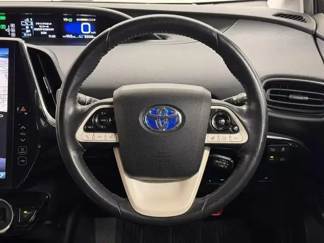 トヨタ プリウス ＰＨＶ A プレミアム 三重県 2018(平30)年 5.4万km ホワイトパールクリスタルシャイン プラグインハイブリッド/FF/インパネCVT/純正 11.6インチ 縦型ナビ/（AM/FM/USB/iPod/Bluetooth/AUX/TV）/バックカメラ/モデリスタエアロ（F/S/R下）/【OP】ETC2.0/Toyota Safety Sense/・プリクラッシュセーフティ/・レーンディパーチャーアラート（操舵支援付）/・レーダークルコン/・オートハイビーム/・ふらつき検知機能/・ブラインドスポットモニター/・インテリジェントクリアランスソナー（巻き込み警報機能付）/・シンプルインテリジェントパーキングアシスト/など/装備/・本革シート/・シートヒーター（D/N）/・ステアリングヒーター/・カラーヘッドアップディスプレイ/・AC100Vアクセサリーコンセント（ヴィークルパワーコネクター付・V2H対応・コンセント2ヶ）/・オートエアコン/・オートライト/・4灯 LEDヘッドライト＆LED フロントフォグランプ/・【OP】純正17inAW/・ステアリングスイッチ/・プッシュスタート/・スマートキーx2/・保/取/ナビ取/・充電ケーブル（AC200V用・7m）/など