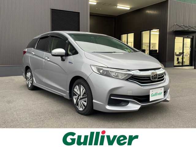 ホンダ シャトル ハイブリッド ホンダセンシング 新潟県 2018(平30)年 6.9万km ルナシルバーM 　社外ナビ/　Bluetooth/　フルセグテレビ/　バックカメラ/　アイドリングストップ/　バックカメラ/　ウィンカーミラー/　クルーズコントロール/　ドアバイザー/　プッシュスタート/　ETC/　ドライブレコーダー