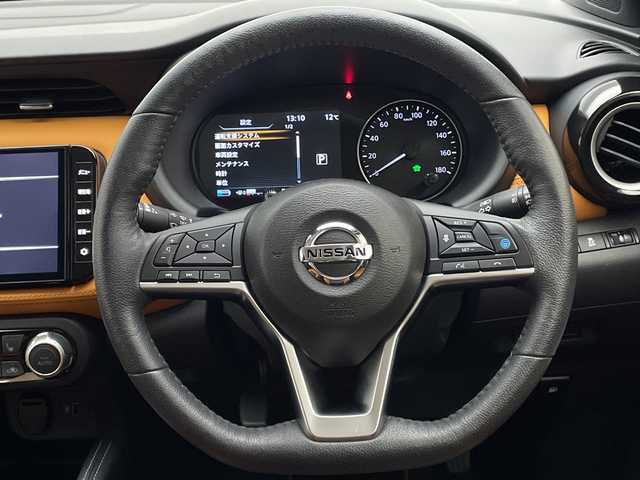 日産 キックス X ツートーンインテリアED 宮崎県 2020(令2)年 2.3万km プレミアムホライズンオレンジ/ピュアブラック 2トーン 禁煙車/エマージェンシーブレーキ/純正9型ナビTV/（CD/DVD/Bluetooth/FMAM/フルセグTV)/純正ビルトインETC/純正ドライブレコーダー/純正セキュリティアラーム/純正17インチアルミ/純正LEDオートライト/純正LEDフォグ/純正フロアマット/プロパイロット/アラウンドビューモニター/オートマチックハイビーム/デジタルインナーミラー/クリアランスソナー/電子パーキング/オートホールド/ステアリングヒーター/前席シートヒーター/オートエアコン/本革巻ハンドル/ハーフレザーシート/インテリジェントキー/プッシュエンジンスタート/スペアキー/新車時保証書/取扱い説明書