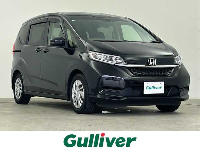 ホンダ フリード G ホンダセンシング 千葉県 2021(令3)年 3.1万km クリスタルブラックパール 禁煙車/ホンダセンシング/純正9型ナビ（VXM-217VFNi）/CD/DVD/SD/USB/Bluetooth/フルセグTV/バックカメラ/両側電動スライドドア/衝突軽減ブレーキ/レーダークルーズコントロール/レーンアシスト/横滑り防止機能/アイドリングストップ/シートヒーター/ビルトインETC/LEDオートライト/後席ロールサンシェード/スマートキー/プッシュスタート/スペアキー1本/取扱説明書/保証書