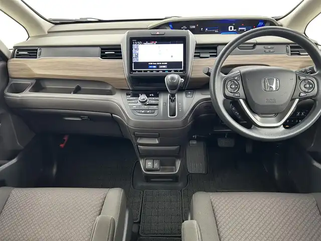 ホンダ フリード G ホンダセンシング 千葉県 2021(令3)年 3.1万km クリスタルブラックパール 禁煙車/ホンダセンシング/純正9型ナビ（VXM-217VFNi）/CD/DVD/SD/USB/Bluetooth/フルセグTV/バックカメラ/両側電動スライドドア/衝突軽減ブレーキ/レーダークルーズコントロール/レーンアシスト/横滑り防止機能/アイドリングストップ/シートヒーター/ビルトインETC/LEDオートライト/後席ロールサンシェード/スマートキー/プッシュスタート/スペアキー1本/取扱説明書/保証書